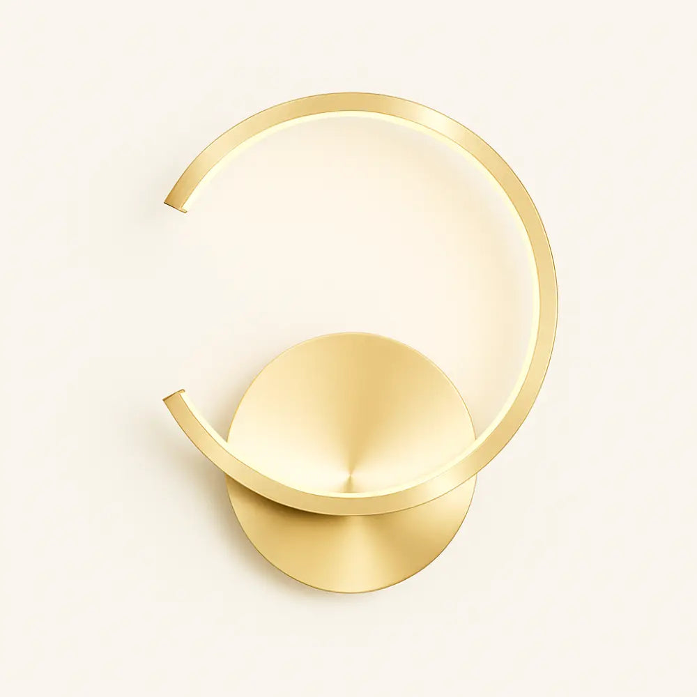 Applique murale dorée LED circulaire en métal style moderne pour chambre