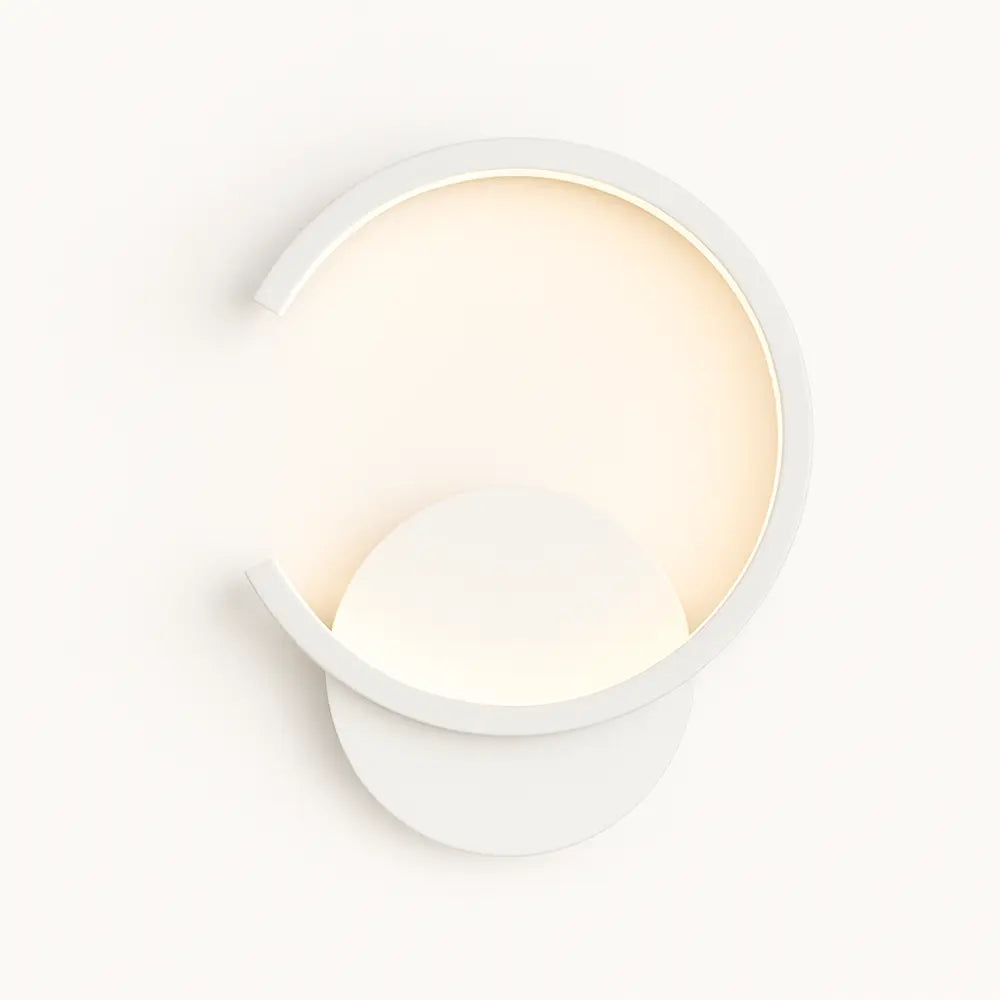 Applique murale dorée LED circulaire en métal style moderne pour chambre