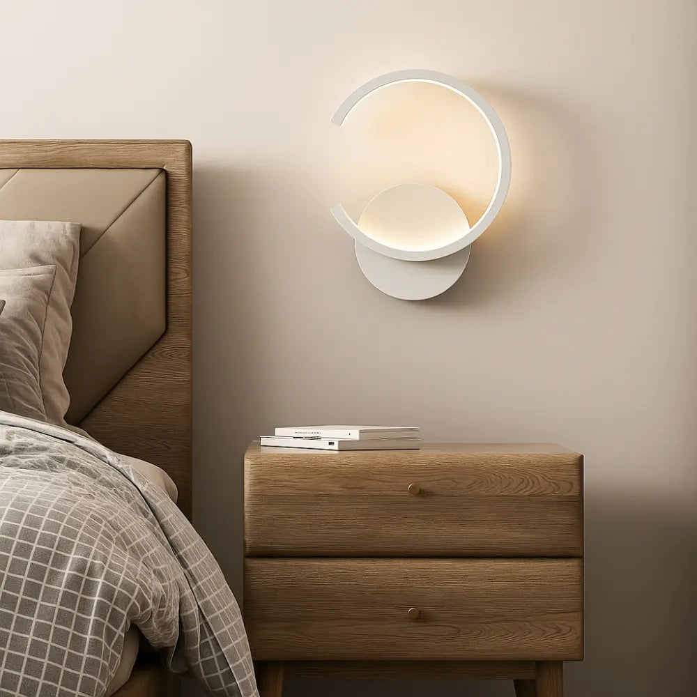 Applique murale dorée LED circulaire en métal style moderne pour chambre