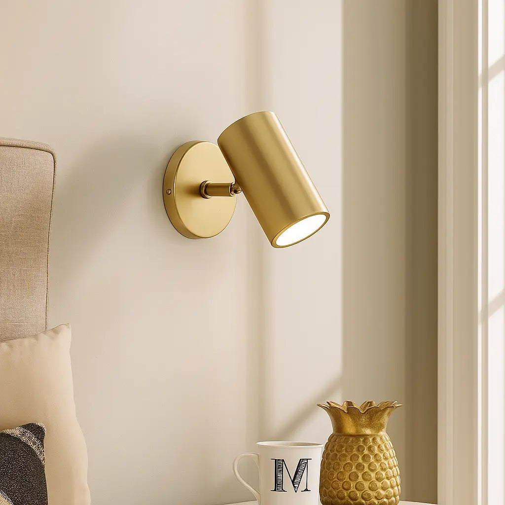 Applique murale dorée design cylindrique orientable style moderne