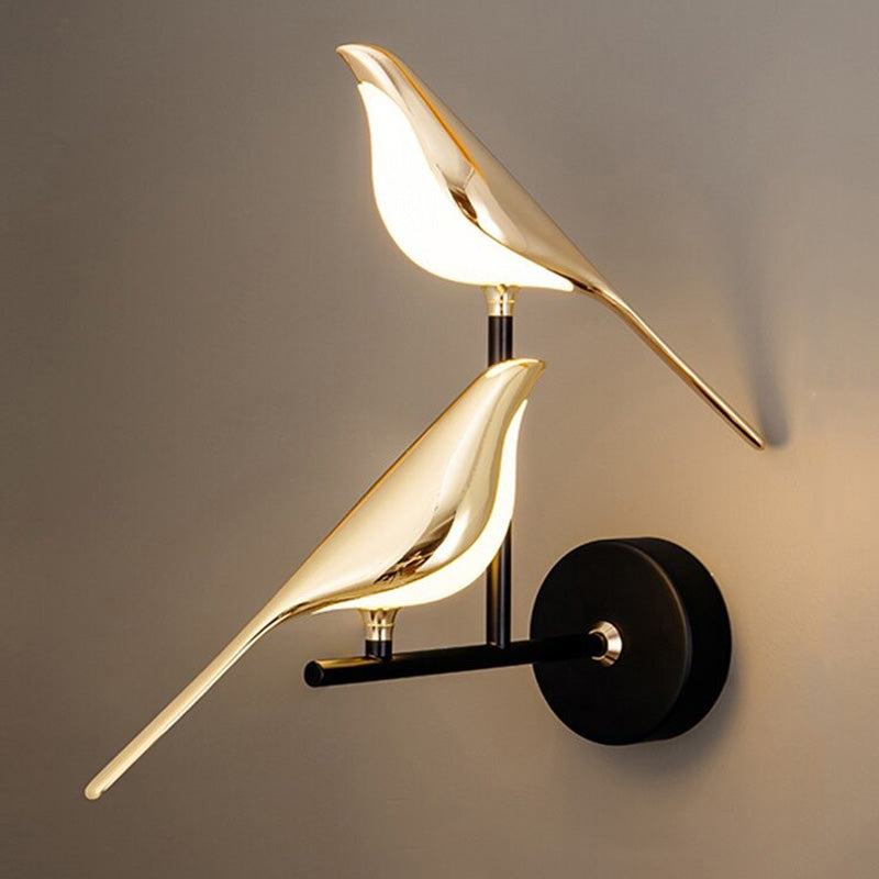 Applique murale escalier oiseau doré lumière douce effet apaisant design élégant installation aisée adaptée divers espaces