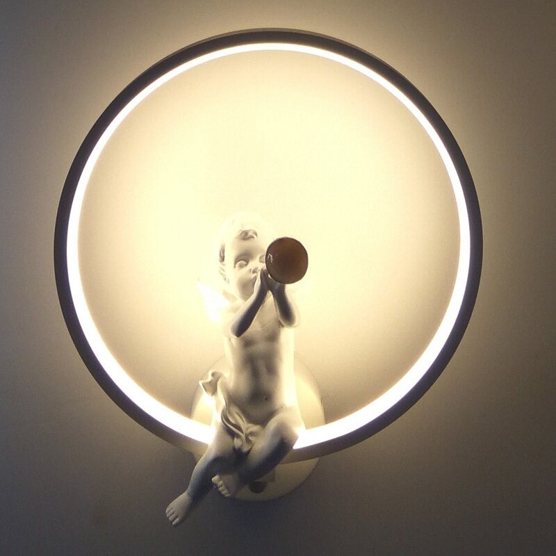 Applique murale ronde LED avec motifs angéliques en relief