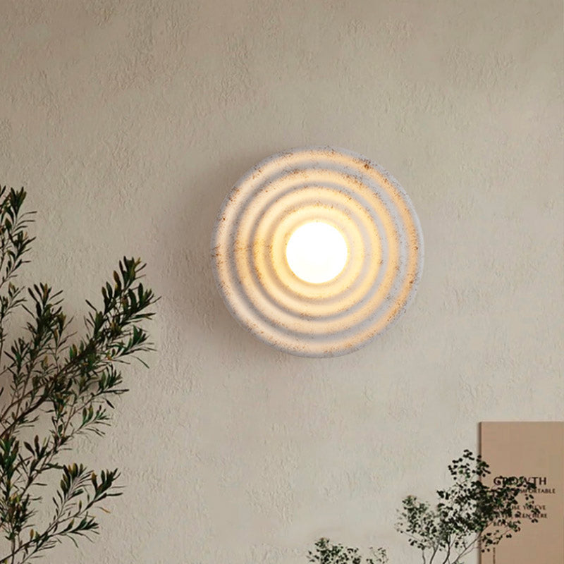 applique murale circulaire en résine et verre